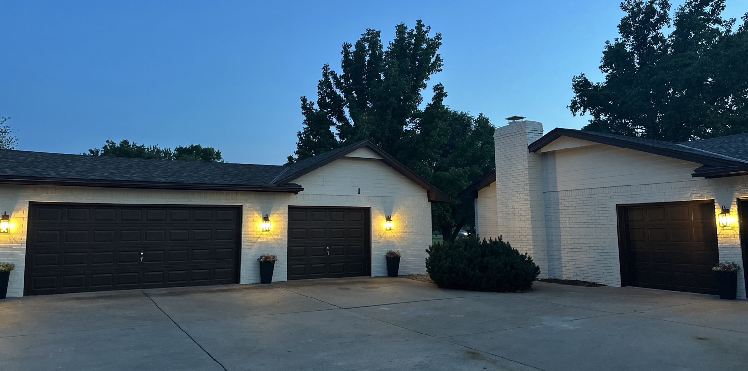 Detached garage/shop and attached garage at 1 Woodland Drive